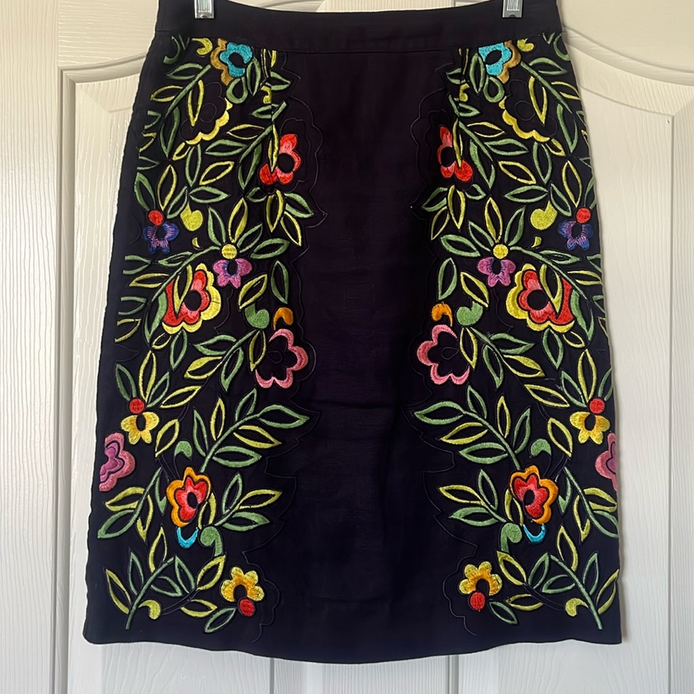 Navy blue lined, linen skirt from Anthropologie, size 2, with embroidery.